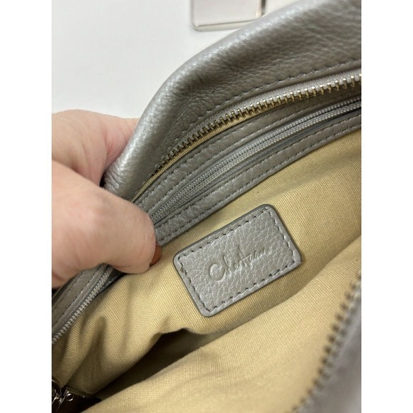 Cole Haan Crossbody Bag Silver Leather Buckles Outside Pocket Zipper Closure - Picture 3 of 11